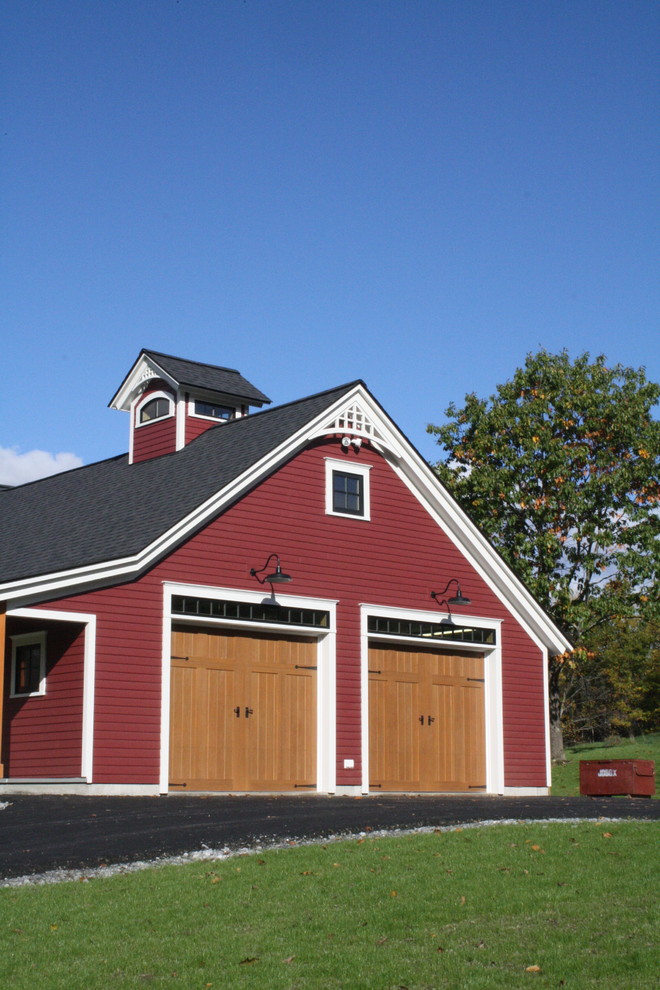 Design ideas for a large farmhouse attached double garage in Cincinnati.