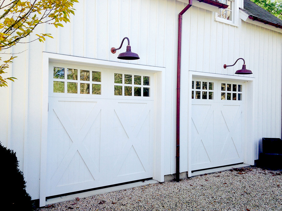 Design ideas for a large classic attached double garage in New York.