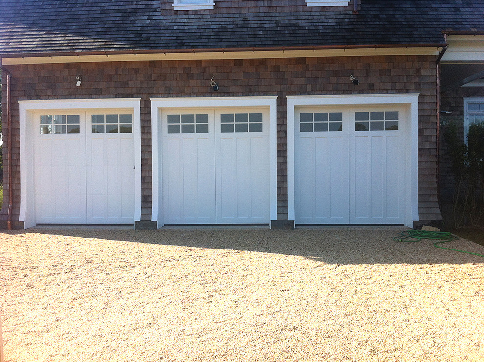 Example of a large classic attached three-car carport design in New York