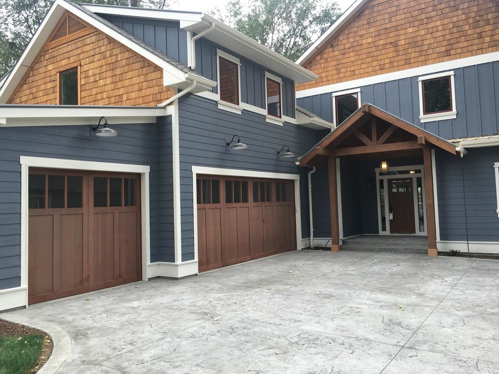 Inspiration for a medium sized traditional attached garage in Boise with three or more cars.