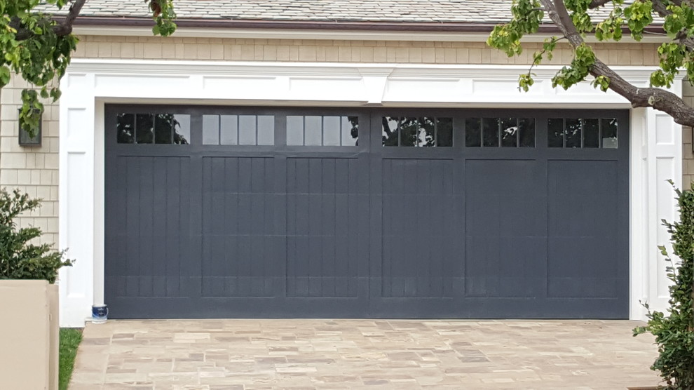 Photo of a medium sized classic attached double garage in Los Angeles.