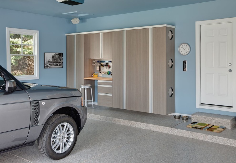 Example of a large trendy attached two-car garage design in Seattle