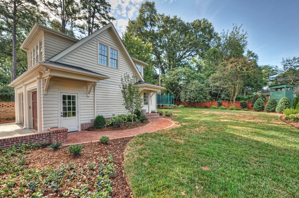Mid-sized elegant detached two-car garage photo in Charlotte