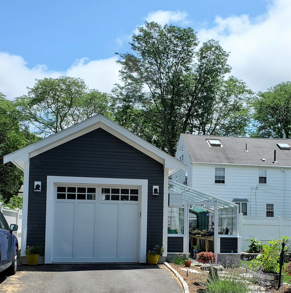 Inspiration for a timeless detached one-car garage remodel in Boston