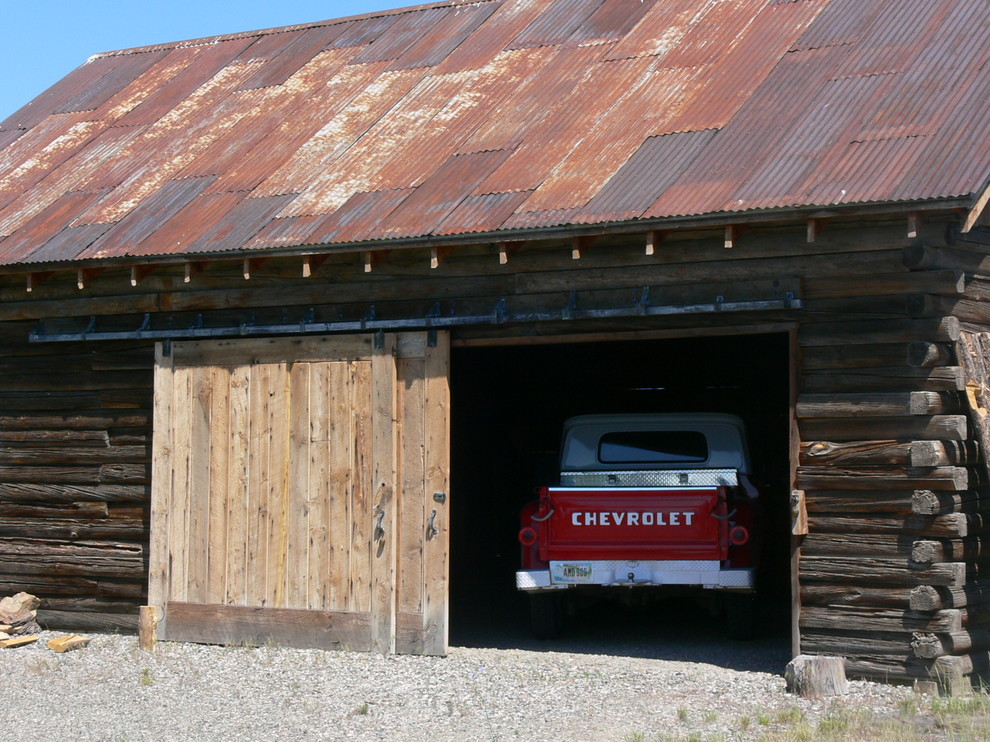 This is an example of a rustic garage in Other.