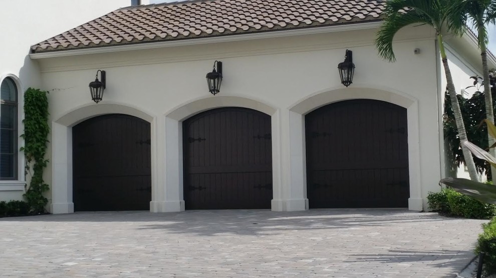 This is an example of a medium sized classic attached double garage in Miami.