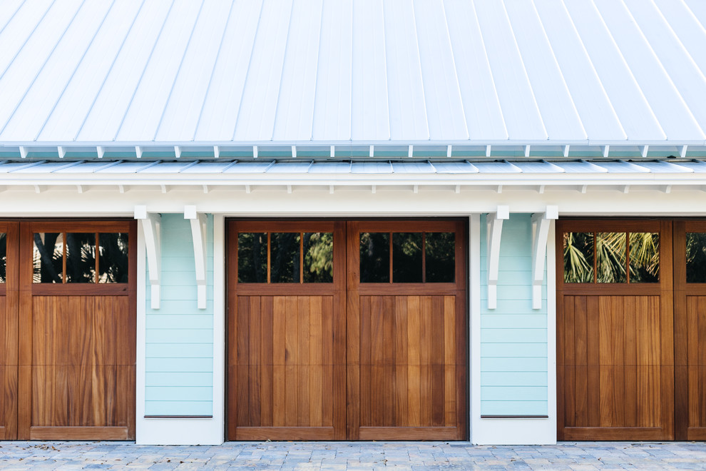 Design ideas for a nautical detached carport in Charleston with four or more cars.