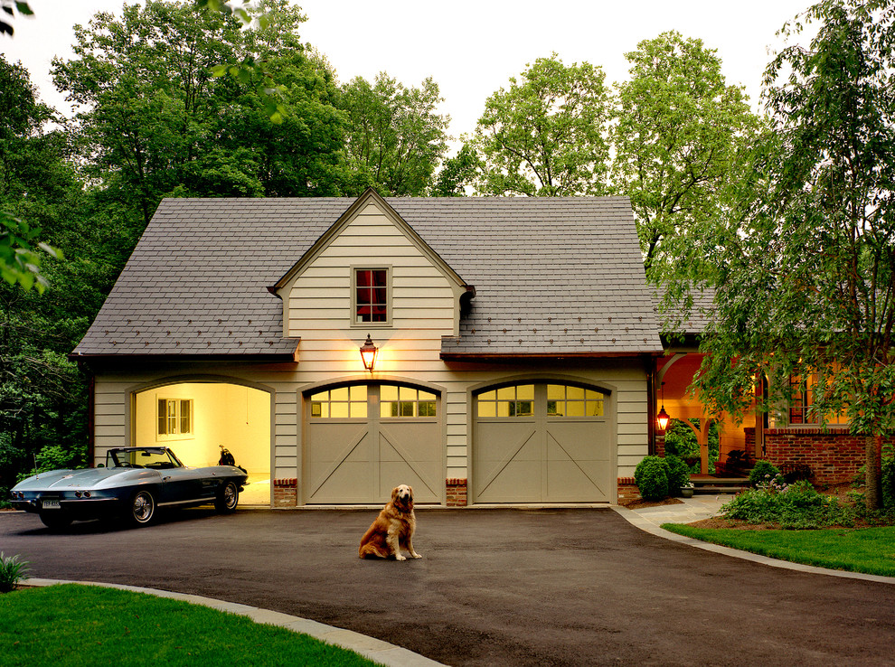 Inspiration for a traditional attached garage in DC Metro with three or more cars.