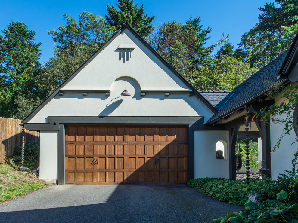 Garage - mid-sized craftsman detached two-car garage idea in Seattle