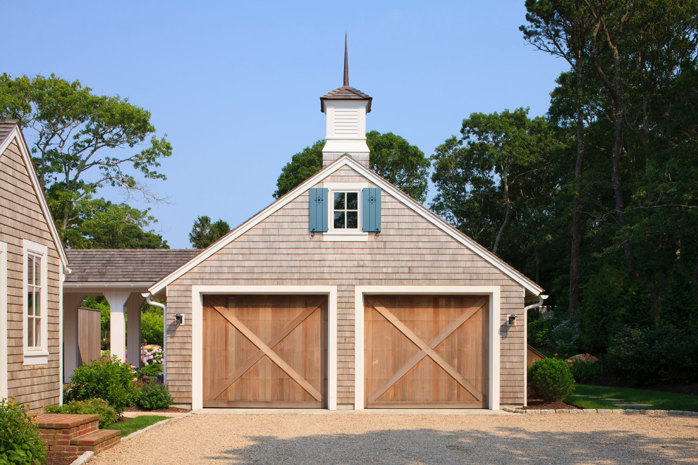 This is an example of a large traditional detached double garage in Boston.