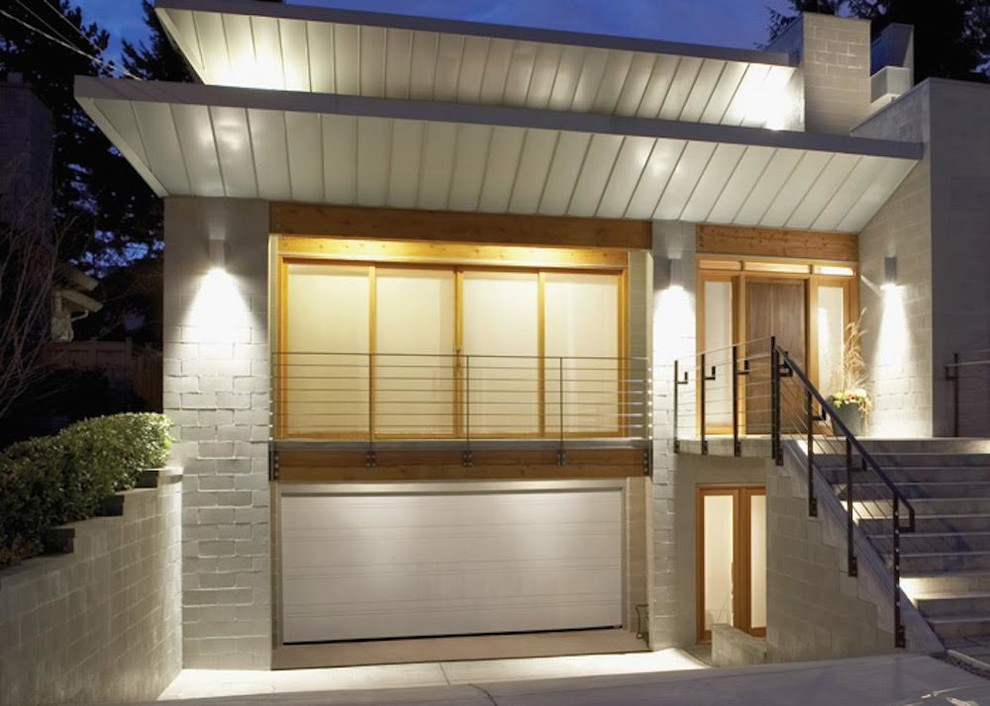 Design ideas for a medium sized contemporary attached double garage in Cedar Rapids.