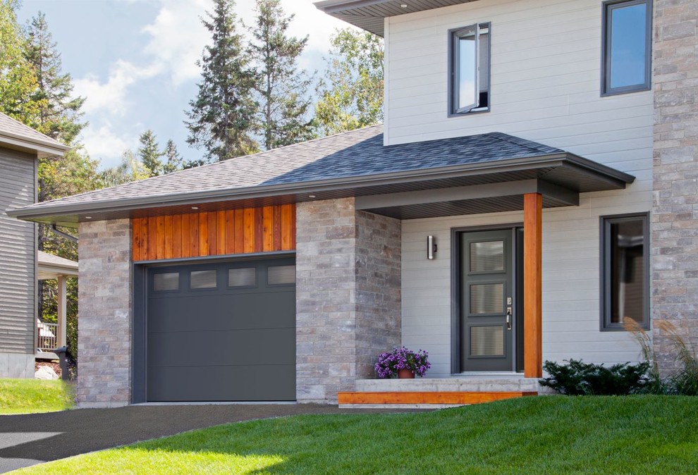 Inspiration for a small timeless attached one-car garage remodel in Cedar Rapids