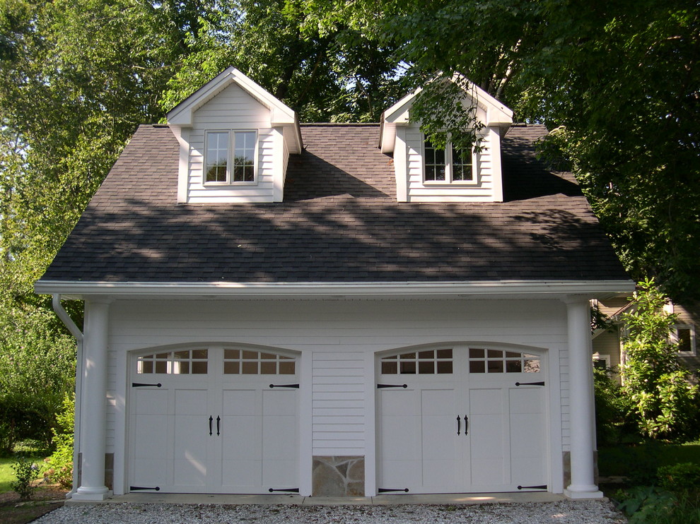 Design ideas for a large beach style detached double garage in Baltimore.