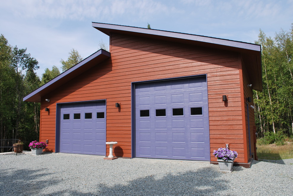 Cette photo montre un grand garage pour deux voitures séparé tendance.
