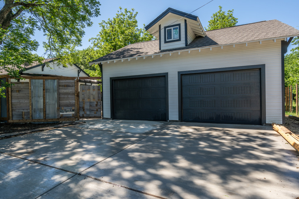 Design ideas for a medium sized traditional detached double garage in Dallas.
