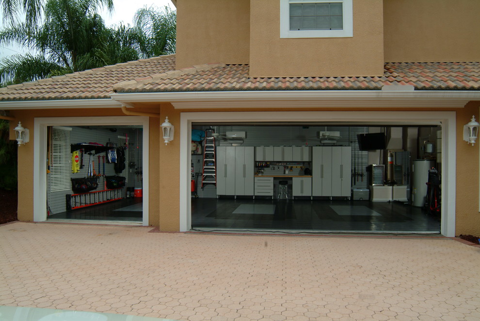 Mid-sized urban attached two-car garage photo in Orlando