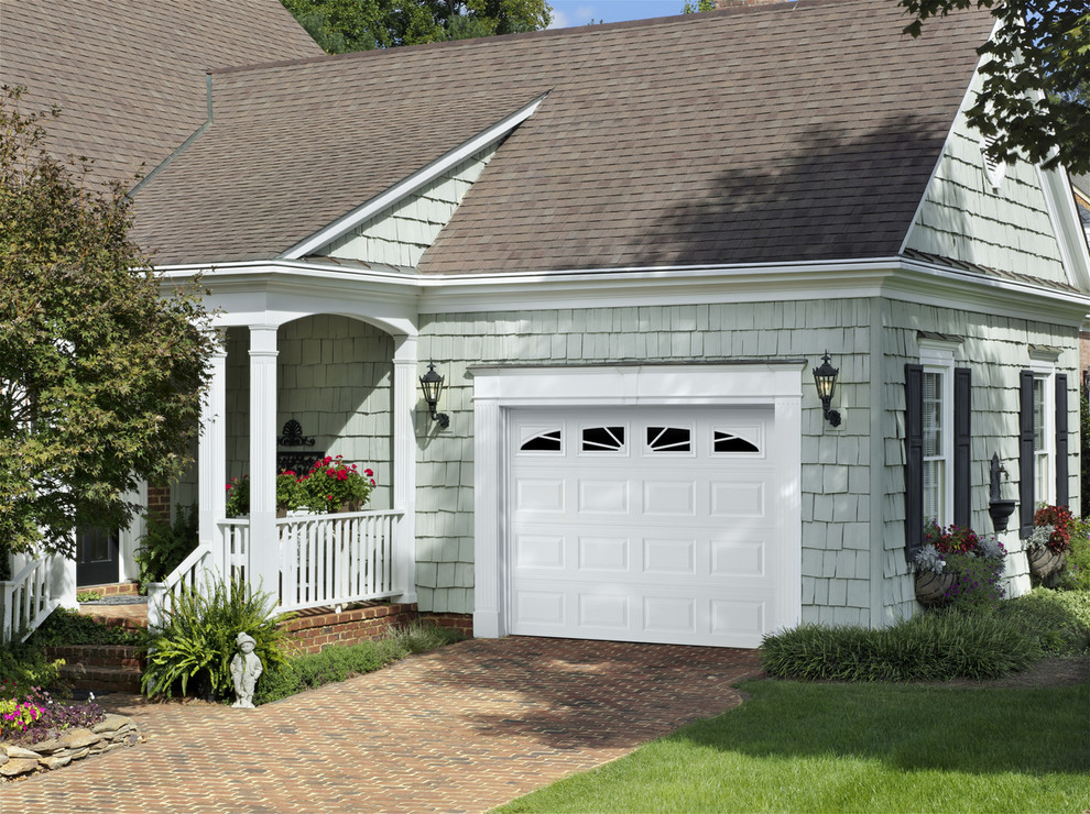 Example of a small classic attached one-car garage design in Atlanta