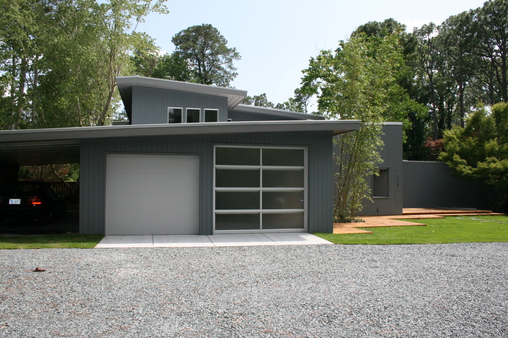 Photo of a contemporary double garage in Raleigh.