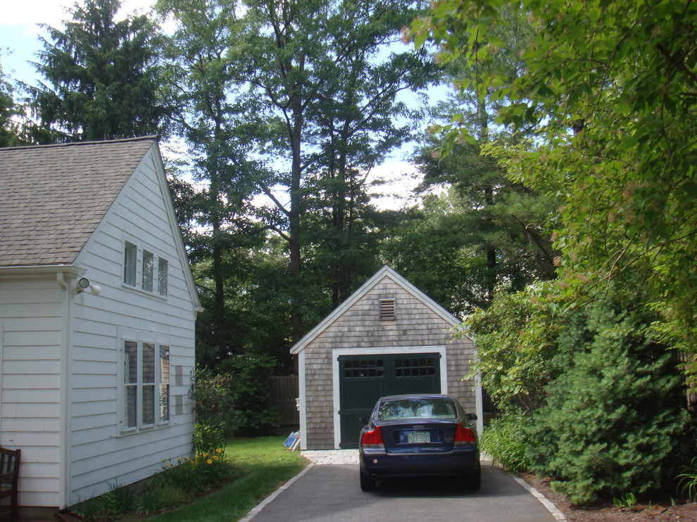 Exemple d'un garage pour une voiture séparé chic de taille moyenne.