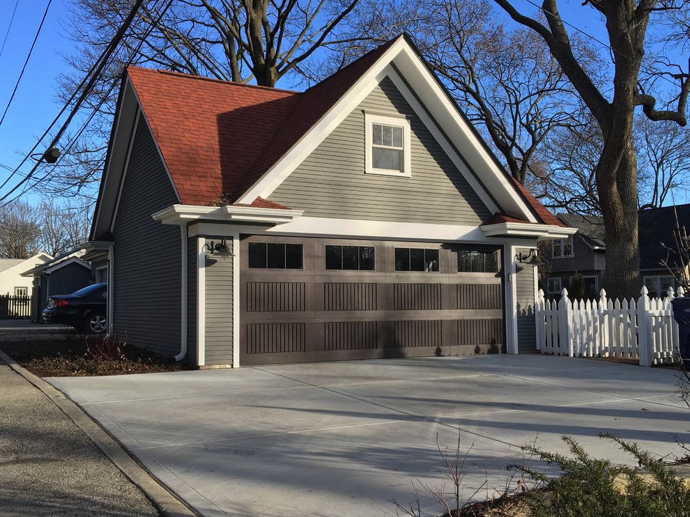 Photo of a traditional detached double garage workshop in Chicago.
