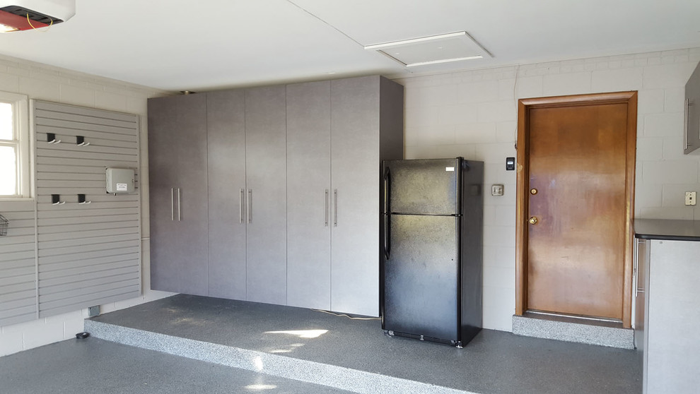 Idee per un garage per un'auto connesso design di medie dimensioni con ufficio, studio o laboratorio