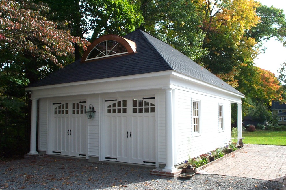 This is an example of a medium sized classic detached double garage in Boston.