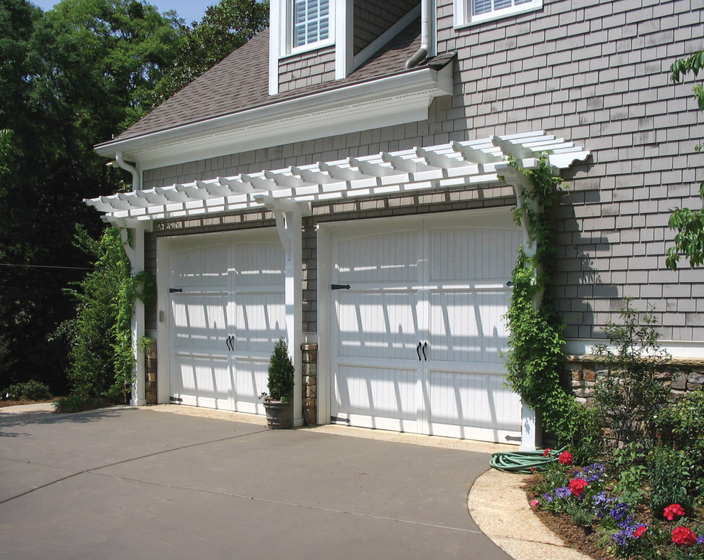Photo of a traditional attached double garage in Atlanta.