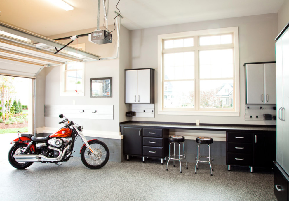 Photo of a medium sized modern attached garage workshop in Los Angeles.