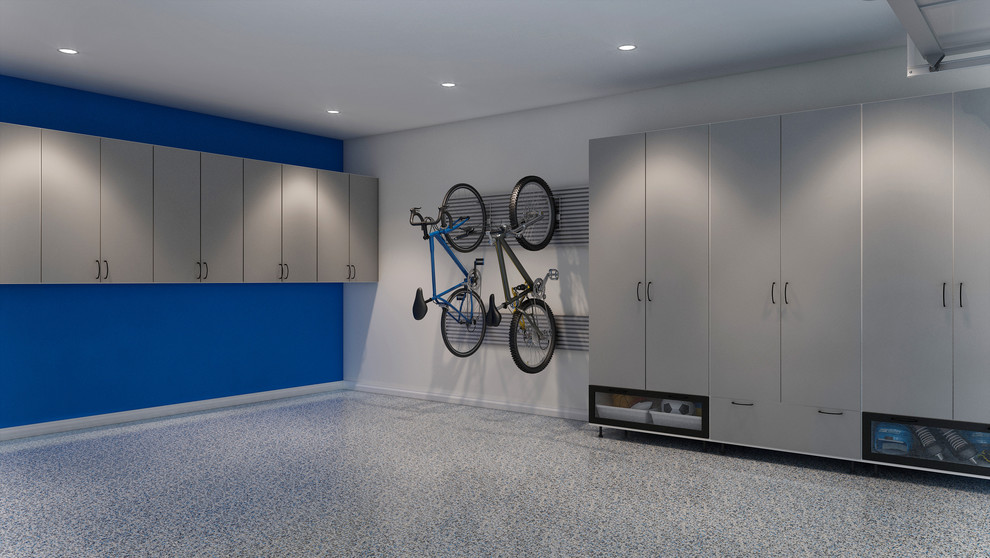 Idée de décoration pour un grand garage attenant minimaliste.