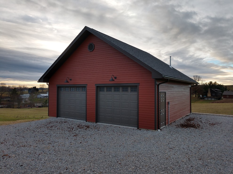 Inspiration pour un garage pour deux voitures séparé traditionnel de taille moyenne avec un bureau, studio ou atelier.