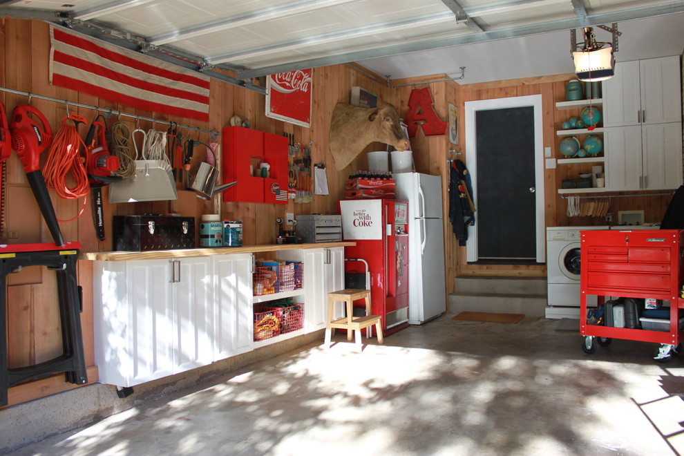 Garage - eclectic one-car garage idea in Dallas
