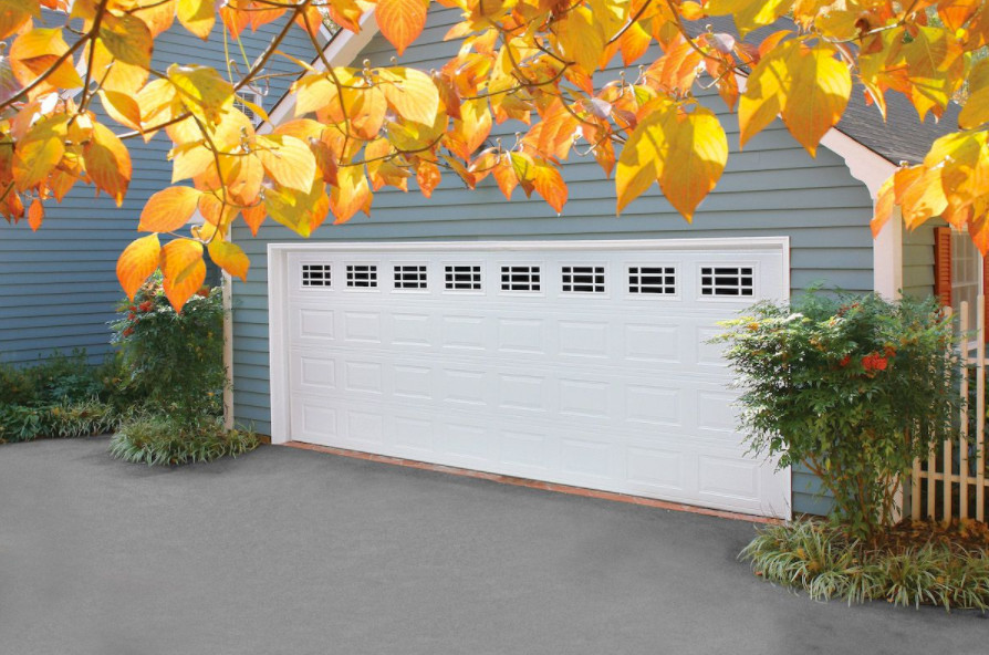 Photo of a medium sized classic attached double garage in DC Metro.