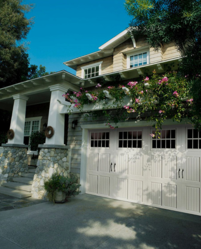 Inspiration for a medium sized traditional attached double garage in DC Metro.