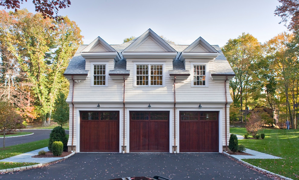 Design ideas for a traditional detached garage in New York with three or more cars.
