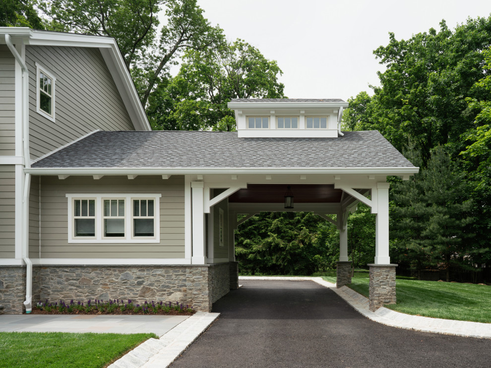 Example of a large transitional attached two-car carport design in New York