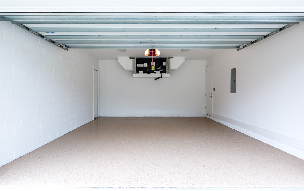 Idéer för en mellanstor modern tillbyggd garage och förråd