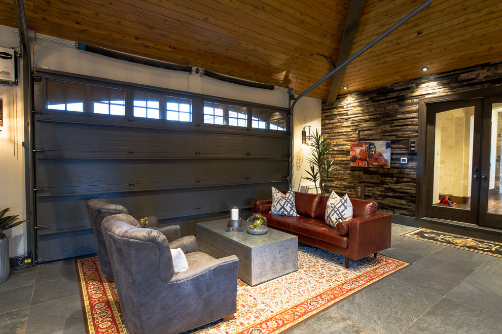 This is an example of an expansive classic attached garage in Denver.