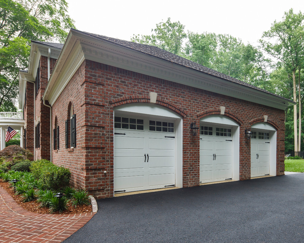 This is an example of a large traditional attached garage in New York with three or more cars.