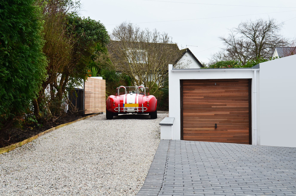 Small detached one-car garage photo in Dorset