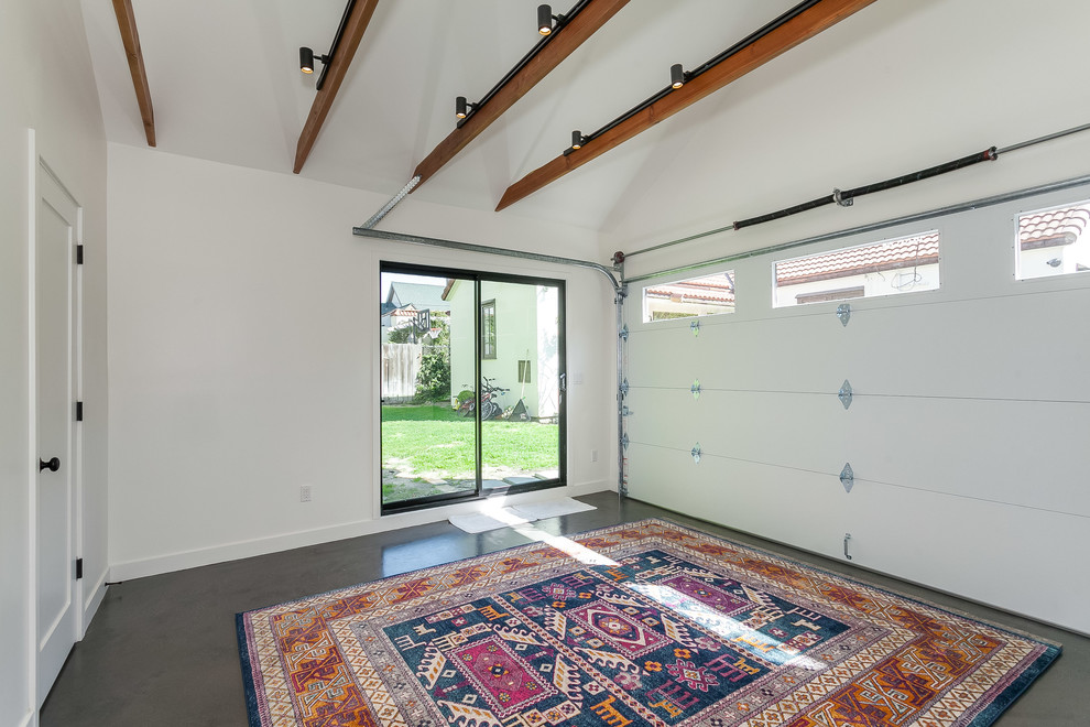 This is an example of a medium sized classic detached double garage workshop in Los Angeles.