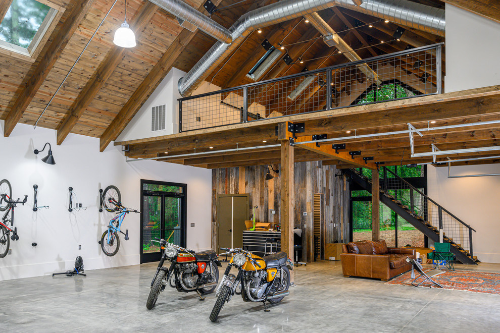 Design ideas for an expansive urban detached garage workshop in Other with four or more cars.
