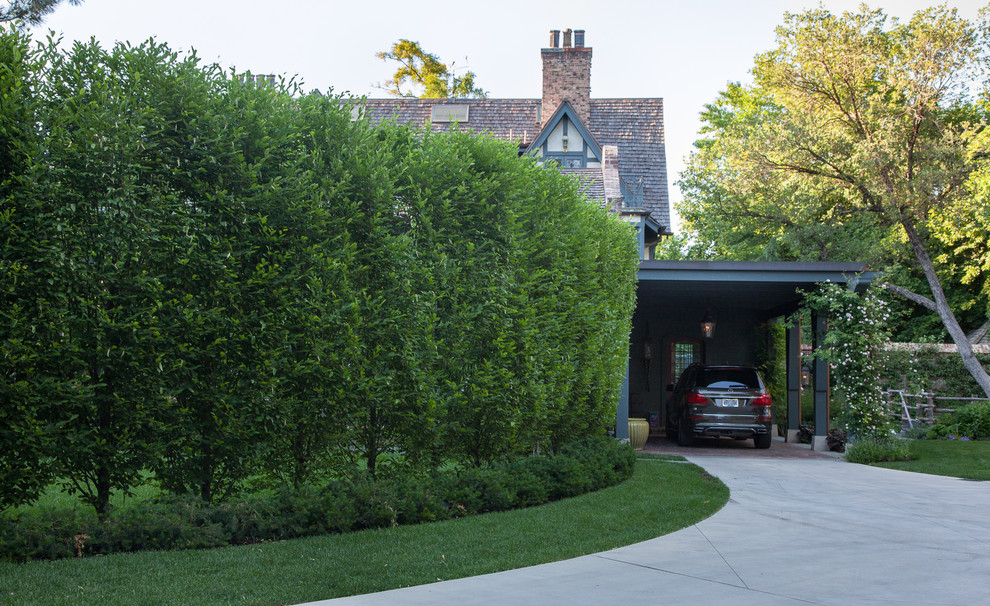 Inspiration for a transitional one-car carport remodel in Salt Lake City