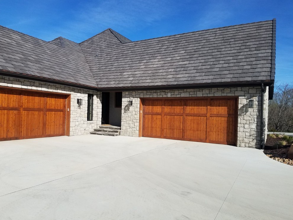 Homes with Natural Stone Traditional Garage Kansas City by