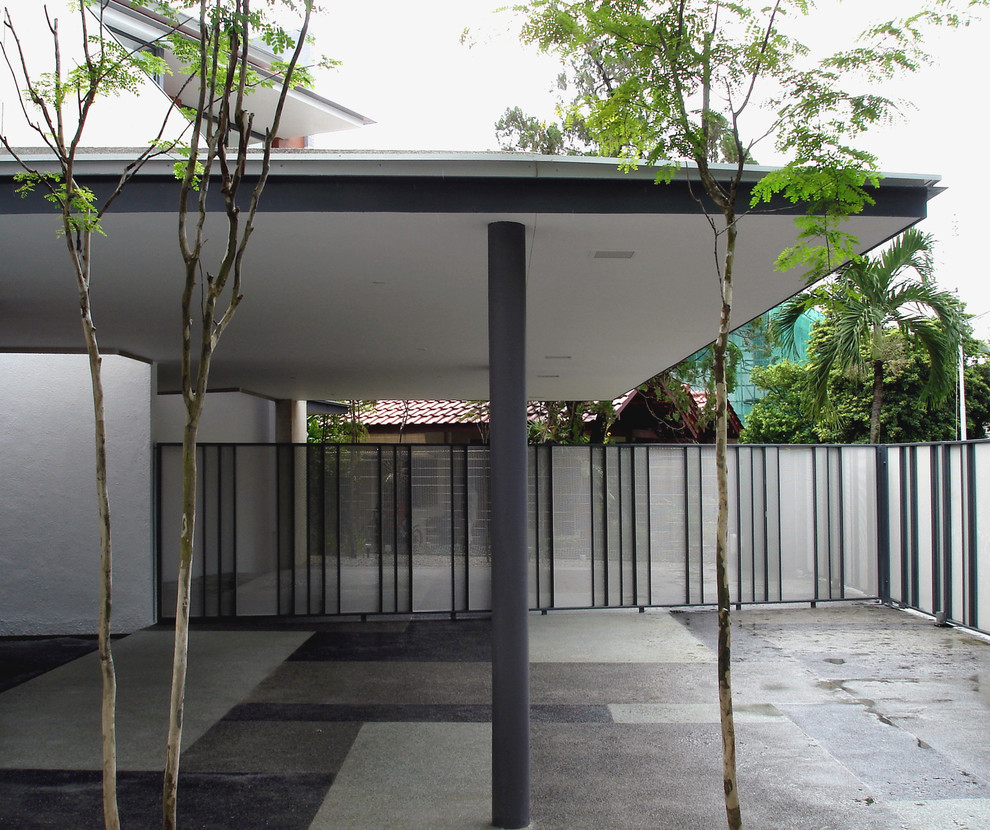 Houses at Jalan Berjaya Contemporary Garage Singapore by BHN