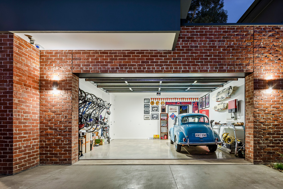 Réalisation d'un garage pour deux voitures attenant design.