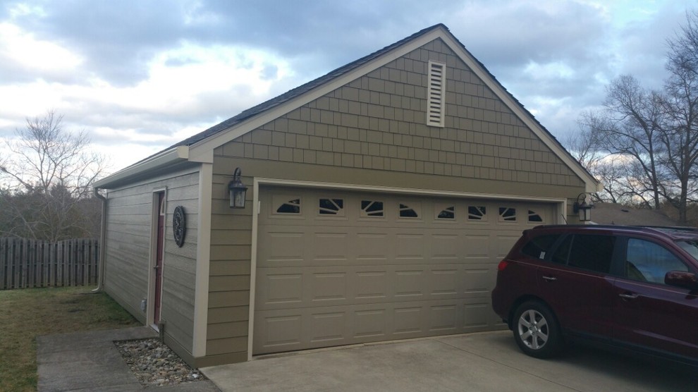 Immagine di un garage per due auto indipendente chic di medie dimensioni