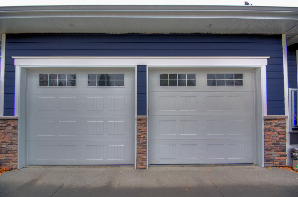 Inspiration for a medium sized modern attached double carport.