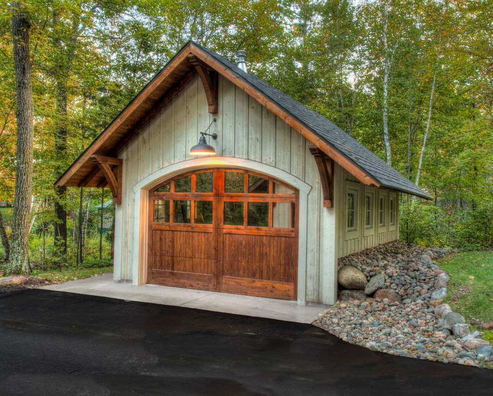 Photo of a medium sized rustic detached single garage in Minneapolis.