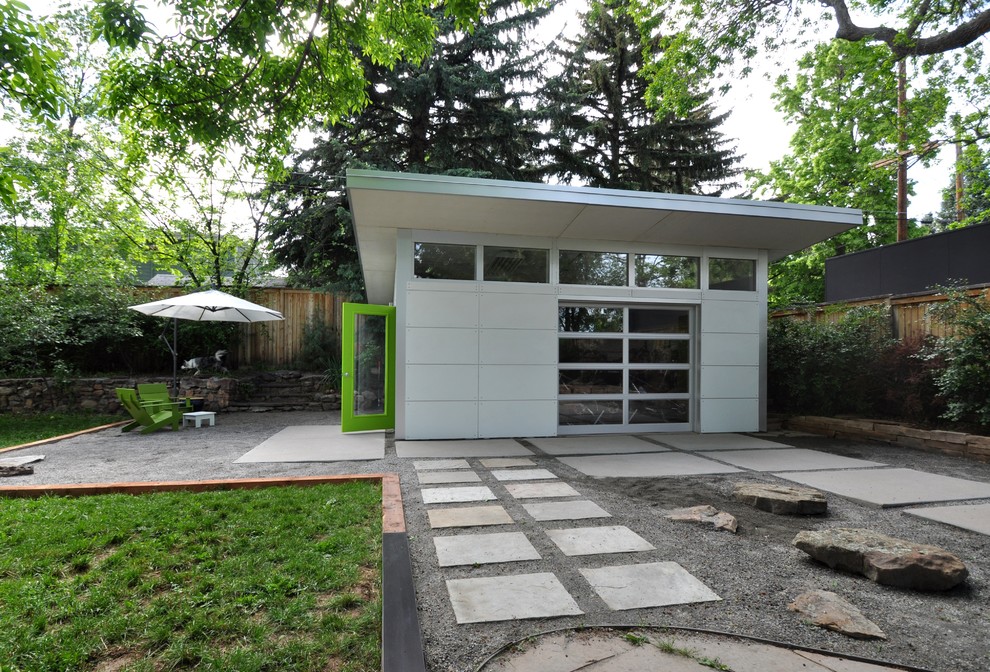 Large minimalist detached two-car garage workshop photo in Denver