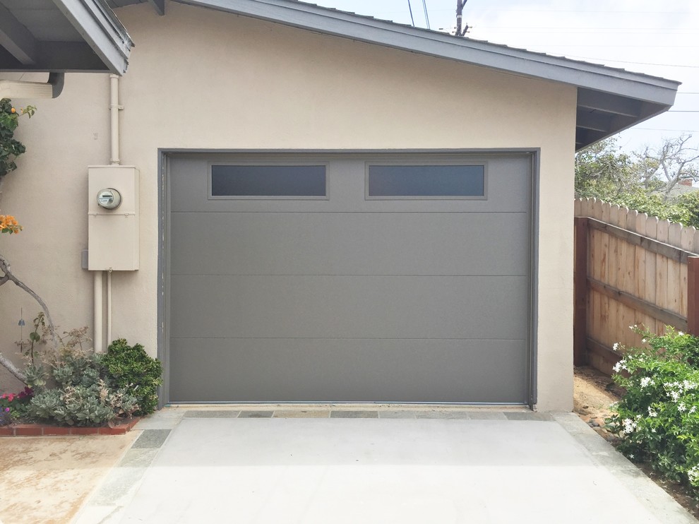 Medium sized contemporary attached single garage in San Diego.